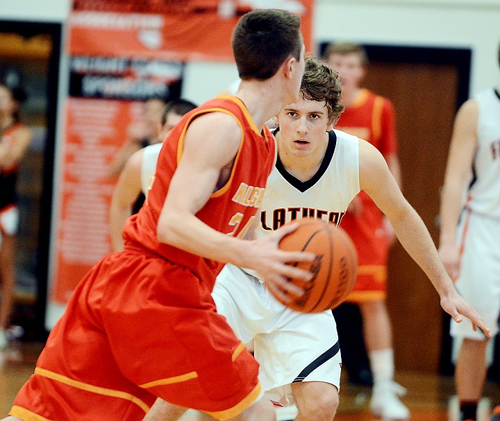 &lt;p&gt;Flathead junior GUARD Alex Croymans (10) watches Missoula Hellgate junior Devin Bray (24), who looks for an open player to pass to, during Saturday&#146;s Western AA basketball game at Flathead High School.&#160;&lt;/p&gt;