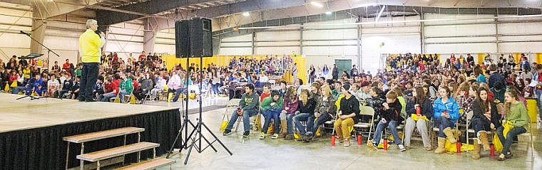 <p>Dan Zorn, Kalispell Public Schools assistant superintendent, speaks Friday to hundreds of eighth-grade students during the Graduation Matters Kalispell event at the Flathead County Fairgrounds.</p>