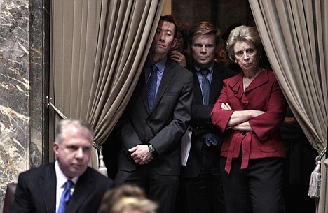 &lt;p&gt;Gov. Chris Gregoire, right, looks on at a Senate debate to legalize same-sex marriage with Rep. Jaimie Pedersen, second right, and Michael Shiosaka, partner of Rep. Ed Murray, left, Wednesday, Feb. 1, 2012, in Olympia, Wash. The state Senate is set to vote Wednesday night on a proposal to legalize same-sex marriage in Washington state. If passed by the Senate, the measure moves to the House, which has enough votes to pass the bill. Democratic Gov. Chris Gregoire supports the measure and said she will sign it into law. (AP Photo/Elaine Thompson)&lt;/p&gt;