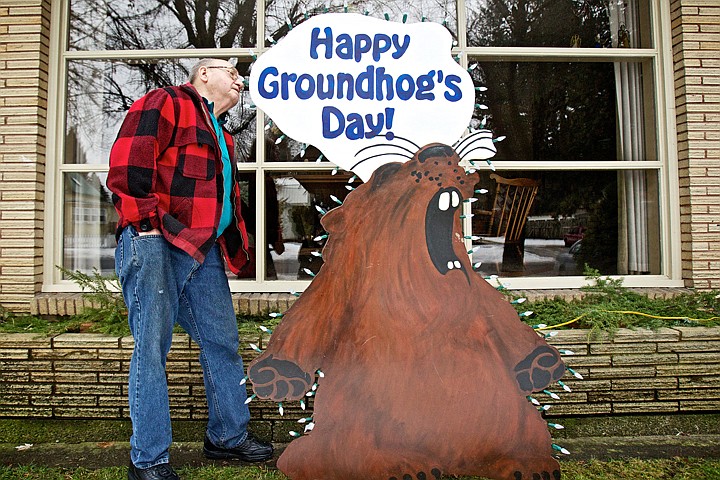 &lt;p&gt;JEROME A. POLLOS/Press Del Gittel inspects the new lights he installed on the plywood groundhog that he's been displaying in his front yard of his Coeur d'Alene home for the past 20 years. What started out as a joke, has now prompted the Gittel family to celebrate Groundhog's Day every year with the display and a dinner.&lt;/p&gt;