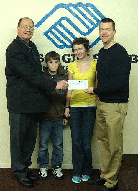 &lt;p&gt;In celebration of the 75th anniversary of D.A. Davidson, the Boys and Girls Club of Kootenai County recieved a $1,000 donation. More than $127,000 was donated to 83 nonprofits in 50 locations where Davidson Companies offices are located. From left are Cort Wilcox, D.A. Davidson and former Boys and Girls Club president; club members Johnny Smith and Tiffany Spencer; and Ryan Davis, Boys and Girls Club executive director.&lt;/p&gt;