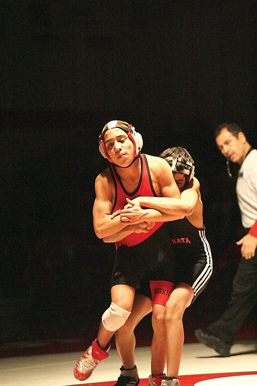 He may appear to be in a jam but Othello's Isaiah Barrera (in red) would eventually cruise to a 17-3 win over Ephrata's Rolo Padron at 103-pounds. Othello would beat Ephrata 39-20 on Friday to clinch a second straight unbeaten CWAC campaign.