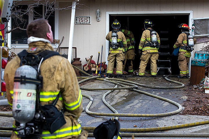 &lt;p&gt;Kootenai County Fire and Rescue firefighters remove the insulation from a garage that caught fire on East First Street in Post Falls on Thursday morning. Kootenai County Fire and Rescue responded to the fire at 10:07 a.m. The cause of the fire is non-suspicious but still officially undetermined.&lt;/p&gt;