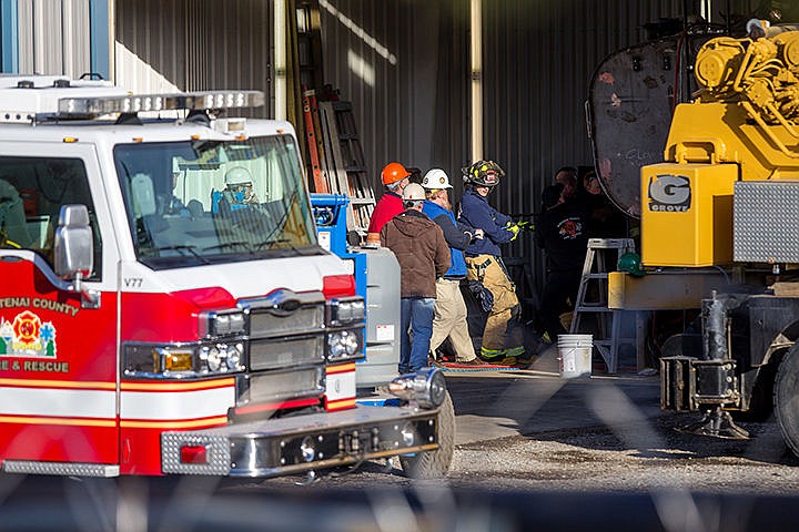 &lt;p&gt;Kootenai County Fire and Rescue works with Ground Force employees pull a rope on the scene of an industrial accident at Ground Force. An employee was spraying the inside of a tank when he suffered a medical emergency, according to Chief Scot Haug. Post Falls Police officers were able to successfully remove the unidentified employee from the tank and transport him to Kootenai Health.&lt;/p&gt;