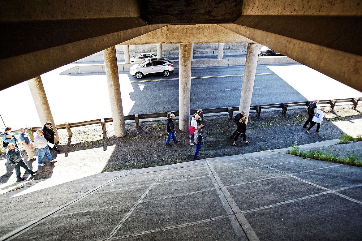 &lt;p&gt;Members of the Post Falls City Council and Post Falls Urban Renewal Agency examine field and traffic conditions for the Highway 41 pedestrian trail project during a site visit Thursday, May 24, 2012.&lt;/p&gt;