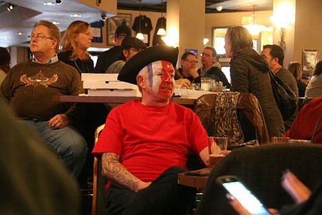 &lt;p&gt;Lou Chandler of Coeur d&#146;Alene rocks a tricolor hat and red, white and blue face paint as he cheers for the New England Patriots at the Coeur d&#146;Alene Eagles on Super Bowl Sunday.&lt;/p&gt;