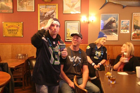 &lt;p&gt;Diehard super fans Patrick Swift, left, and friend Jeff Stoeckert, both of Coeur d&#146;Alene, express dismay Sunday during a play in the first quarter of the Super Bowl while watching the game at the Iron Horse.&lt;/p&gt;