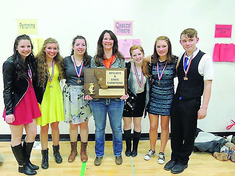 &lt;p&gt;From left, Michelle Baetge, Alexandra Bartmess, Sarah Moen, Coach Kelley Comstock, Madison Short, Caitlin Hanson and Storm Bakkila, celebrate with their state trophy after winning the Montana Class B Drama championship on Saturday in Ennis.&lt;/p&gt;