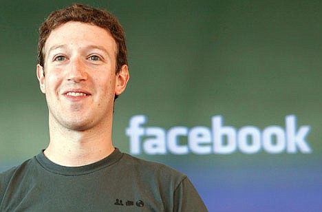 &lt;p&gt;This Oct. 15, 2011 photo shows Facebook CEO Mark Zuckerberg smiling during a meeting in San Francisco. Will Facebook list its stock on the New York Stock Exchange or the Nasdaq? It comes down to &quot;where Mark Zuckerberg wants to get his picture taken,&quot; the founder of one market research company says.&lt;/p&gt;