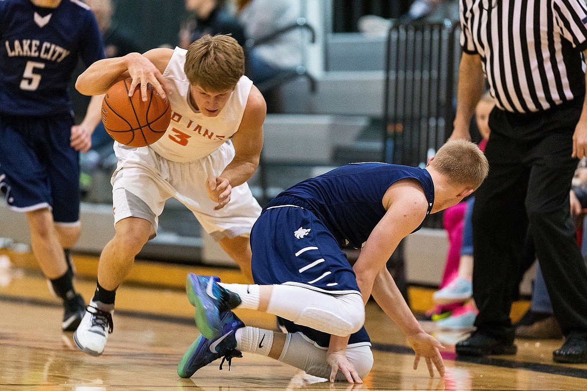 &lt;p&gt;SHAWN GUST/Press Post Falls High&#146;s Wyatt Millsap makes a move around Lake City&#146;s Kodie Kolden after stealing the ball in the fourth quarter.&lt;/p&gt;