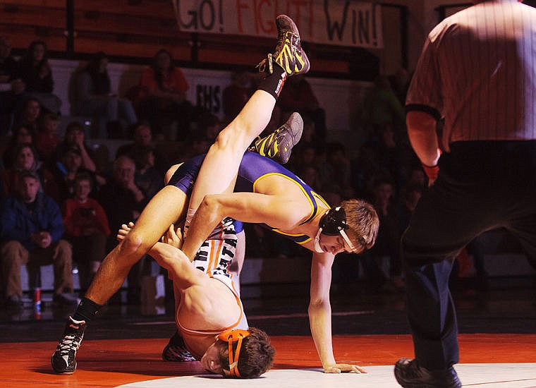 &lt;p&gt;Flathead 160-pound wrestler Anthony Wright (bottom) fights for position against Missoula Big Sky's Jason Riekena Tuesday night during Flathead's loss to Big Sky. Jan. 28, 2014 in Kalispell, Montana. (Patrick Cote/Daily Inter Lake)&lt;/p&gt;