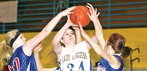 &lt;p&gt;Libby's Taylor Quinn has her third quarter shot blocked by
C-Falls' Hope Burlage, left, and Tori Price&lt;/p&gt;