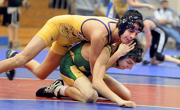 &lt;p&gt;Polson&#146;s Carlos Quinones (top) rides Whitefish&#146;s Matt Barton
during Saturday&#146;s Northwestern A Divisional&#160; in Columbia Falls.
Quinones won by pin.&lt;/p&gt;