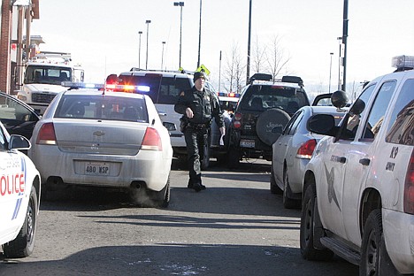 &lt;p&gt;Multiple agencies were involved in Tuesday's pursuit from Coeur d'Alene to Airway Heights, Wash. Here, Washington State Patrol Trooper Matt Weberling assists after the chase ended.&lt;/p&gt;