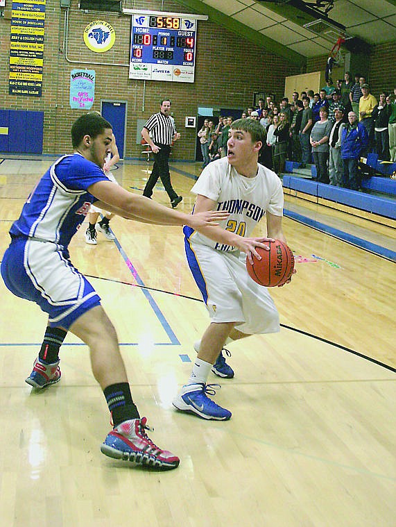 <p>Greg Wadsworth looks for an open teammate during the game against Superior.</p>