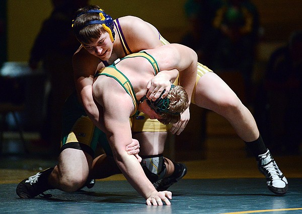 &lt;p&gt;Polson freshman Isaiah Williams wrestles sophomore Matt Gulbrandson in the 215 weight class match up on Saturday afternoon in Whitefish. Williams won by pinfall. (Brenda Ahearn/Daily Inter Lake)&lt;/p&gt;