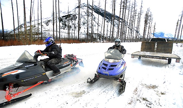 &lt;p&gt;Randy and Cindy Helk of Kalispell set off for a bit of snowmobiling in the Flathead National Forest along the North Fork on Monday afternoon, January 21, north of Columbia Falls. (Brenda Ahearn/Daily Inter Lake)&lt;/p&gt;