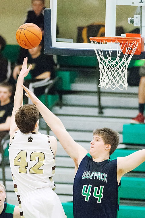 &lt;p&gt;Helena Capital's Carson Dummer (42) shoots over Glacier's Ryan Edwards on Saturday afternoon at Glacier High School.&lt;/p&gt;