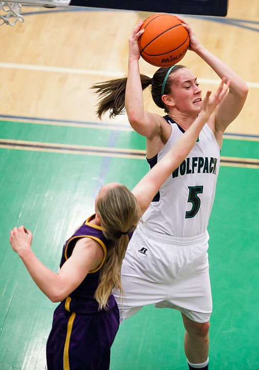 &lt;p&gt;Glacier senior forward Rachel Chery (5) pulls down a rebound Tuesday night during Glacier's home victory over Missoula Sentinel. Tuesday, Feb. 5, 2013 in Kalispell, Montana. (Patrick Cote/Daily Inter Lake)&lt;/p&gt;