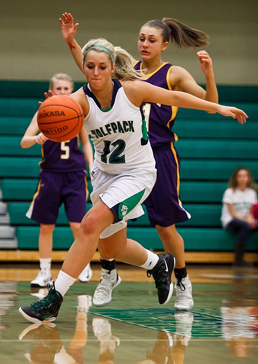 &lt;p&gt;Glacier junior forward Hannah Atlee (12) steals the ball Tuesday night during Glacier's home victory over Missoula Sentinel. Tuesday, Feb. 5, 2013 in Kalispell, Montana. (Patrick Cote/Daily Inter Lake)&lt;/p&gt;