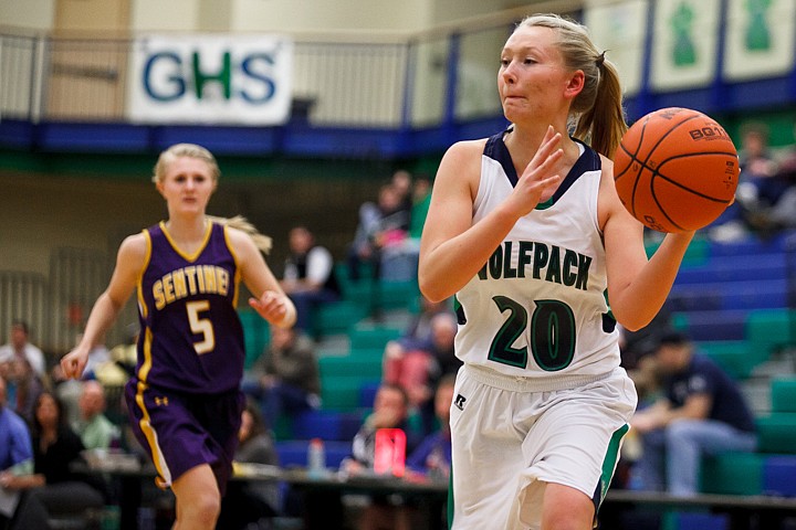 &lt;p&gt;Glacier senior guard Kirstyn Haugenoe (20) passes the ball Tuesday night during Glacier's home victory over Missoula Sentinel. Tuesday, Feb. 5, 2013 in Kalispell, Montana. (Patrick Cote/Daily Inter Lake)&lt;/p&gt;