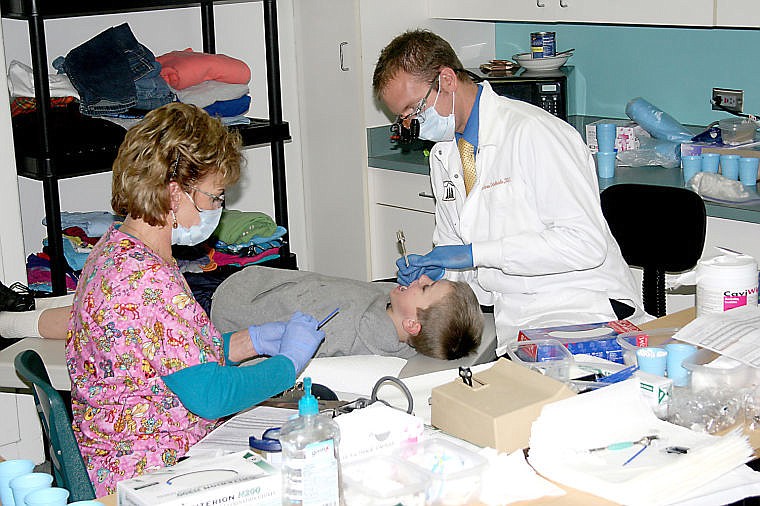 &lt;p&gt;Third grader Orion Plakke has his teeth examined by Dr. Andrew Ordelheide as Superior Elementary School worked with the Mineral County Department of Health to promote oral hygiene in the students.&lt;/p&gt;