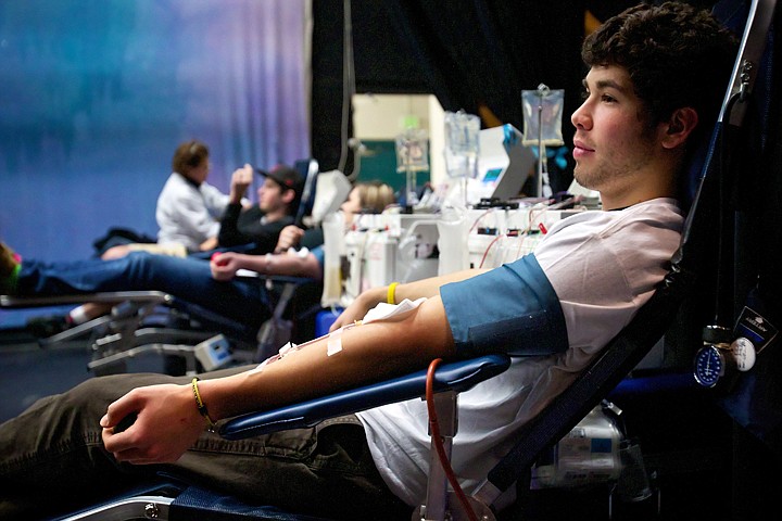 &lt;p&gt;JEROME A. POLLOS/Press Taylor Ward relaxes alongside his classmates Wednesday as he donates a whole unit of his A+ blood type during the Inland Northwest Blood Center blood drive at Lake City High.&lt;/p&gt;