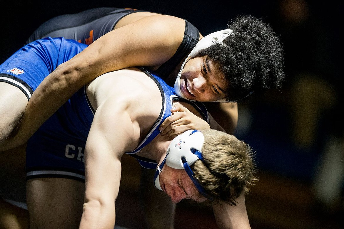 &lt;p&gt;JAKE PARRISH/Press Queong Rahman-Smith of Post Falls, top, grapples for control over Coeur d'Alene's Anthony Reimer on Thursday during the 160-pound bout at a duel at Coeur d'Alene High School. Rahman-Smith defeated Reimer.&lt;/p&gt;