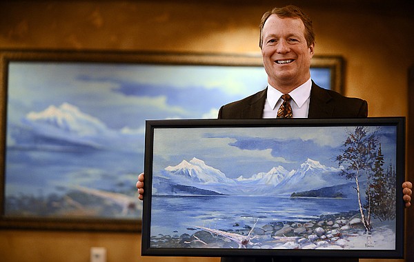 &lt;p&gt;Don Bennett, president of Freedom Bank, holds a replica &lt;span class=&quot;st&quot;&gt;gicl&eacute;e&lt;/span&gt; print of a 4&quot; by 8&quot; painting by Ace Powell on Monday, February 4, in Columbia Falls. One hundred prints will be sold for $395 with $150 dollars from each going to benefit the Glacier Park Fund. The original painting, which is currently on display in the bank, will be on display until next year. Plans are being made for the painting to be moved to Glacier National Park in 2014. (Brenda Ahearn/Daily Inter Lake)&lt;/p&gt;