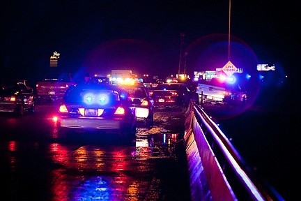 &lt;p&gt;SHAWN GUST/Press Law enforcement vehicles from various Idaho and Washington agencies line the shoulder of Interstate 90 Friday at the state line where a high-speed chase ended. Three arrests were made while the driver fled on foot, prompting officers and K-9 units to search the area. A fourth male was later taken into custody.&lt;/p&gt;