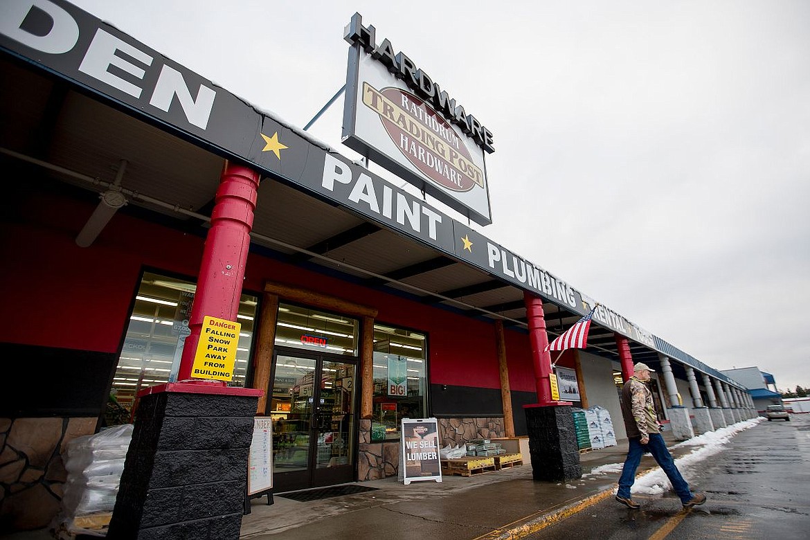 &lt;p&gt;A customer walks back to his car on Thursday after leaving Rathdrum Trading Post Hardware.&lt;/p&gt;