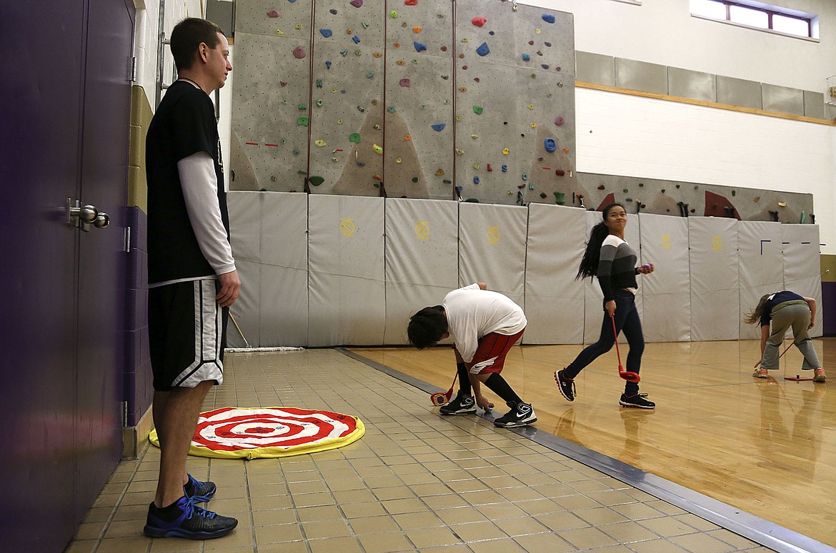 &lt;p&gt;Cameron Milton watches students during a competition during PE class at the middle school in Polson.&lt;/p&gt;