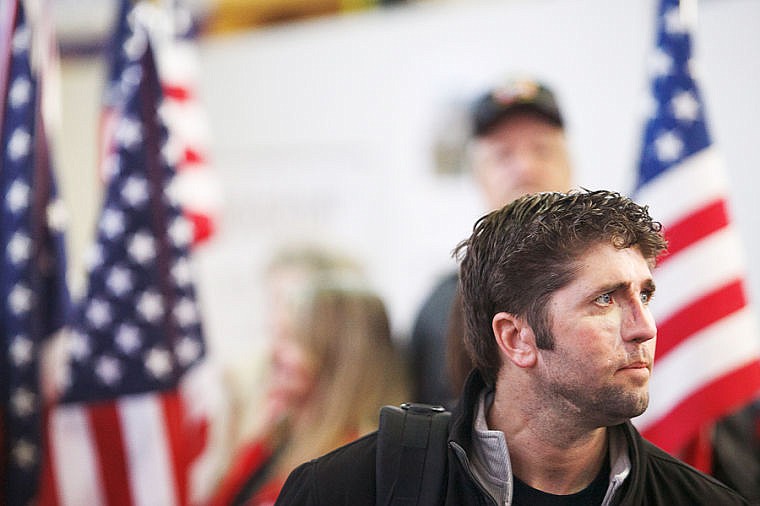 &lt;p&gt;Lt. Jay Redmond of the Navy SEALs is welcomed by the Polson Patriot Guard and Wound Warrior Project volunteers at Glacier Park International Airport. Redmond will be speaking at a reception dinner at the Iron Horse Clubhouse tonight. The public is welcome and reservations can be made by calling 863-3115. Wednesday, Jan. 30, 2013 in Kalispell, Montana. (Patrick Cote/Daily Inter Lake)&lt;/p&gt;