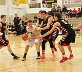 Royal basketball boys split