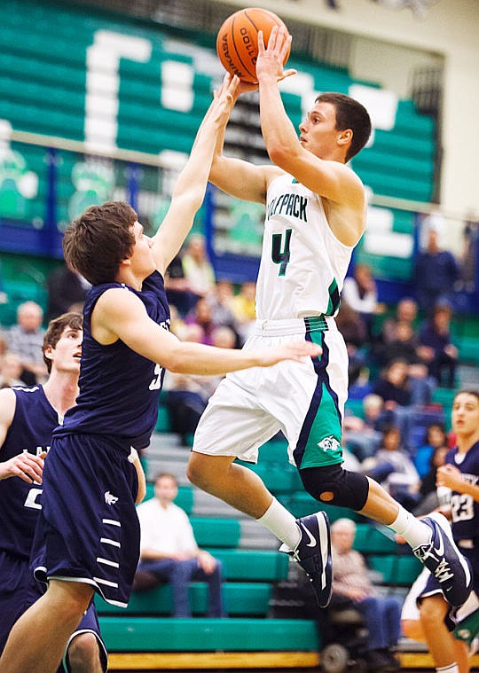 <p>Glacier's Kyle Griffith puts up a shot Saturday during Glacier's victory over Lake City at Glacier High School.</p>