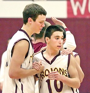 &lt;p&gt;Justin Randall, left, congratulates Cody Orr for scoring the
go-ahead hoop to put Troy up 43-42 to win the game.&lt;/p&gt;