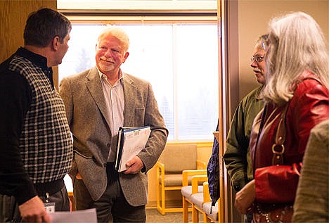 &lt;p&gt;Greg Delavan smiles at Kootenai County Commissioner Marc Eberlein after Delavan was voted to be reinstated as the airport manager during a commissioners meeting on Thursday morning. The Kootenai County Commissioners voted 2-1 to reinstate Delavan as airport manager.&lt;/p&gt;