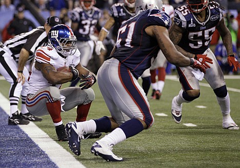 &lt;p&gt;After trying to stop himself just short of the goal line, New York Giants running back Ahmad Bradshaw (44) backs into the end zone for the go-ahead. The New England Patriots allowed Bradshaw to score in order to give them more time to answer with a potential winning score of their own.&lt;/p&gt;