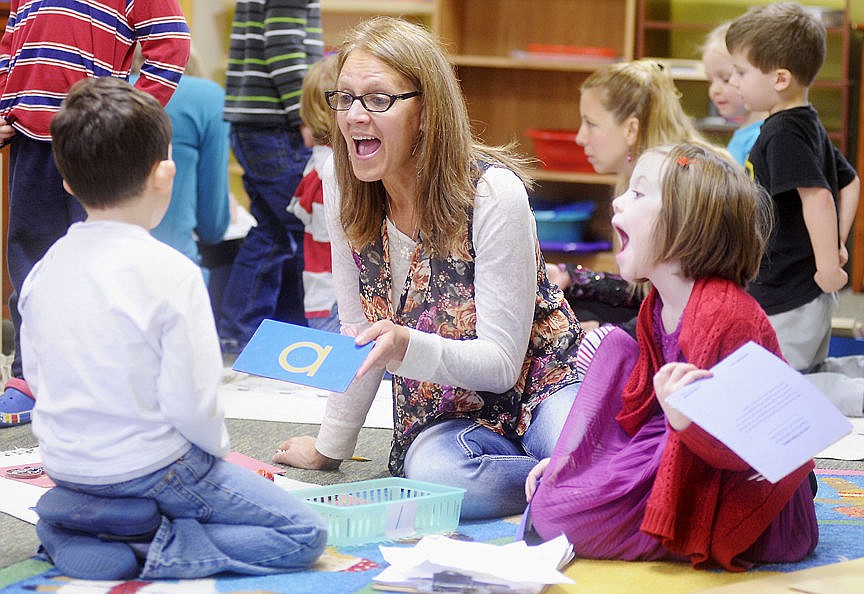 &lt;p class=&quot;p1&quot;&gt;&lt;strong&gt;Joni Williams&lt;/strong&gt;, the director and teacher at the Stillwater Christian Montessori Preschool, helps Trip Chafin with the sounds of the letters as Ceiley Jensen looks on.&#160;&lt;/p&gt;