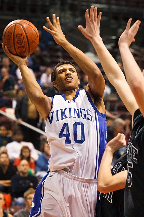<p>SHAWN GUST/Press Deon Watson takes the ball to the hoop during the Idaho state 5A boys basketball tournament last year at the Idaho Center in Nampa.</p>