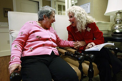 &lt;p&gt;Alexis McKenzie, right, executive director of The Methodist Home of the District of Columbia Forest Side, an Alzheimer's assisted-living facility, shares a light moment with resident Catherine Peake, in Washington, Monday, Feb. 6, 2012. Dementia can sneak up on families because its sufferers are pretty adept at covering lapses early on, longer if their spouses are there to compensate. Doctors too frequently are fooled as well. Now specialists are pushing for the first National Alzheimer's Plan to help overcome this barrier to detection _ urging what's called dementia-capable primary care, more screenings for warning signs, and regular checks of caregivers' own physical and mental health. (AP Photo/Charles Dharapak)&lt;/p&gt;