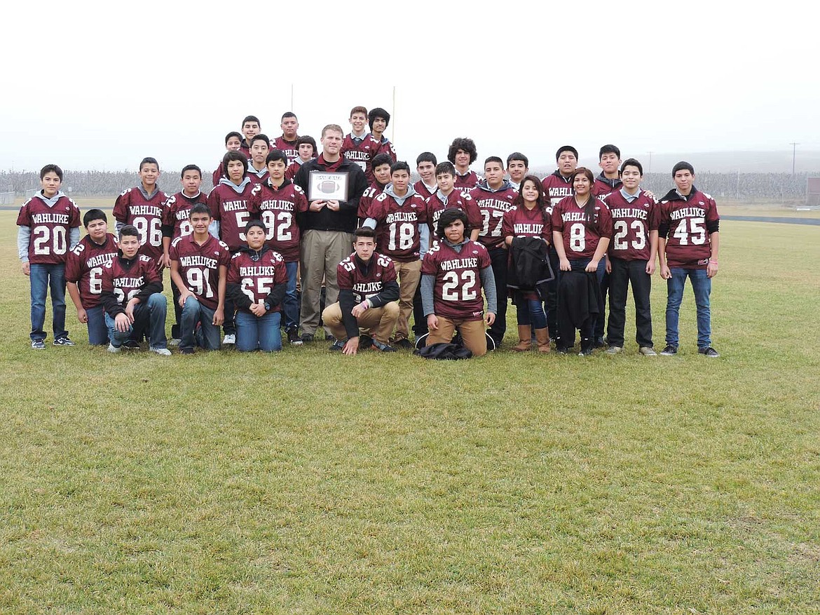 Coach Joel Dugan with his 2014 Wahluke Junior High football team.