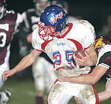 High school football players sign with colleges