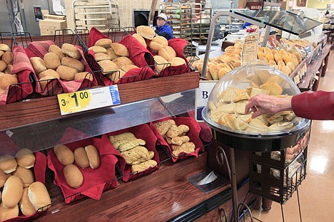 &lt;p&gt;A customer samples some fresh baked bread at a grocery store in Cincinnati on Tuesday, Feb. 7, 2012. Nearly all Americans consume much more sodium than they should, according to a report from the Centers for Disease Control and Prevention released Tuesday, Feb. 7, 2012. Most of the sodium comes from common restaurant or grocery store items. Some foods that are consumed several times a day, such as bread, add up to a lot of sodium even though each serving is not high in sodium. (AP Photo/Al Behrman)&lt;/p&gt;