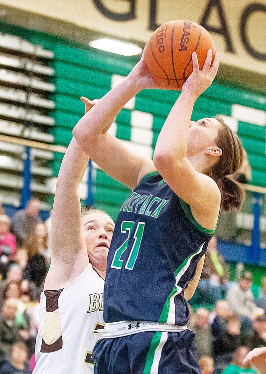 &lt;p&gt;Glacier senior center Cassi Hashley (21) is fouled by Helena Capital senior Sierra Bignell while going up for a shot Saturday afternoon at Glacier High School.&lt;/p&gt;