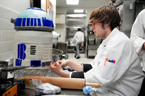 &lt;p&gt;A.J. Schnetter puts some touches on an eight-layer R2D2 cake
that will be more than three tall when it&Otilde;s done. Schnetter has
been working on the Star Wars cake for the last two weeks as part
of Flathead Valley Community College&Otilde;s culinary program. As part of
this year&Otilde;s curriculum, 13 students are making cakes that have
nowhere to go. &Ograve;We&Otilde;ll auction any of them off,&Oacute; said Chef Hillary
Ginepra, the program instructor. &Ograve;These are their first cakes.
These are pretty impressive for people who have never done this
before.&Oacute; Anyone interested in the class&Otilde;s made-from-scratch cakes
can call Chef Hillary at 756-3862.&lt;/p&gt;