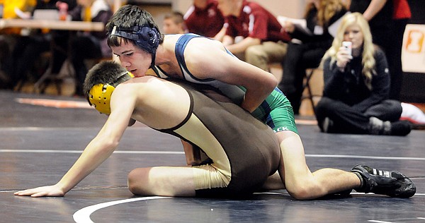 &lt;p&gt;Glacier&#146;s Kaleb Mitchell (top) controls Lawrence Lesofski of
Helena Capital during a semifinal match at 130 pounds Saturday.
Mitchell won by pin. Mitchell finished first.&lt;/p&gt;