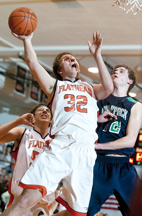 &lt;p&gt;Patrick Cote/Daily Inter Lake Flathead's George Sherwood (32)
puts up a shot over Glacier's Colton Harkins (right) during the
crosstown basketball game at Flathead High School Thursday
night.&lt;/p&gt;