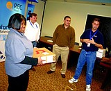 REC Silicon awards laptop to Job Corps student