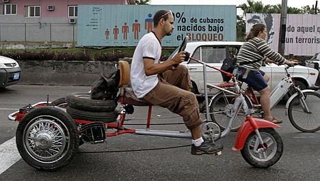 &lt;p&gt;Commuters ride past a billboard that reads in Spanish; &quot;70 percent of Cubans have been born under the Embargo,&quot; in Havana, Cuba, Tuesday Feb. 7, 2012. The United States economic embargo on Communist-run Cuba turned 50 on Tuesday. (AP Photo/Franklin Reyes)&lt;/p&gt;